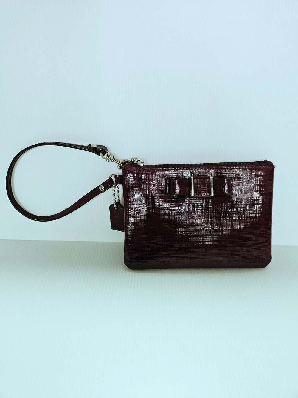 Coach Burgundy Crossgrain Leather Bow Wristlet EUC
